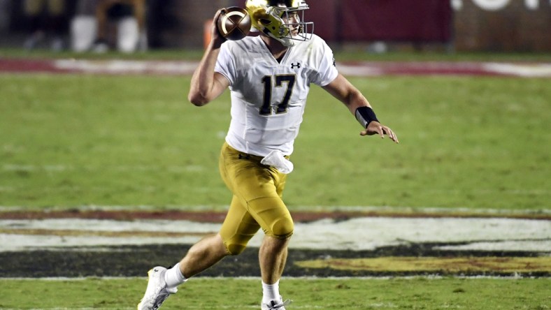 Sep 5, 2021; Tallahassee, Florida, USA; Notre Dame Fighting Irish quarterback Jack Coan (17) runs with the ball during the second quarter against the Florida State Seminoles at Doak S. Campbell Stadium. Mandatory Credit: Melina Myers-USA TODAY Sports