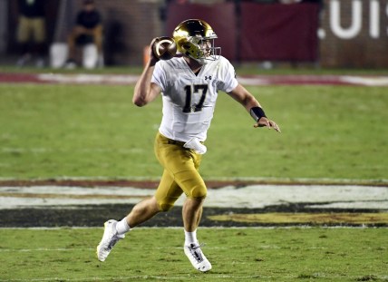 Sep 5, 2021; Tallahassee, Florida, USA; Notre Dame Fighting Irish quarterback Jack Coan (17) runs with the ball during the second quarter against the Florida State Seminoles at Doak S. Campbell Stadium. Mandatory Credit: Melina Myers-USA TODAY Sports