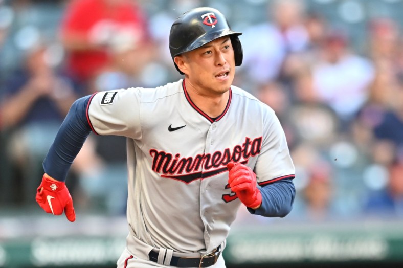 Sep 6, 2021; Cleveland, Ohio, USA; Minnesota Twins right fielder Rob Refsnyder (38) runs to first base after hitting an RBI single during the first inning against the Cleveland Indians at Progressive Field. Mandatory Credit: Ken Blaze-USA TODAY Sports