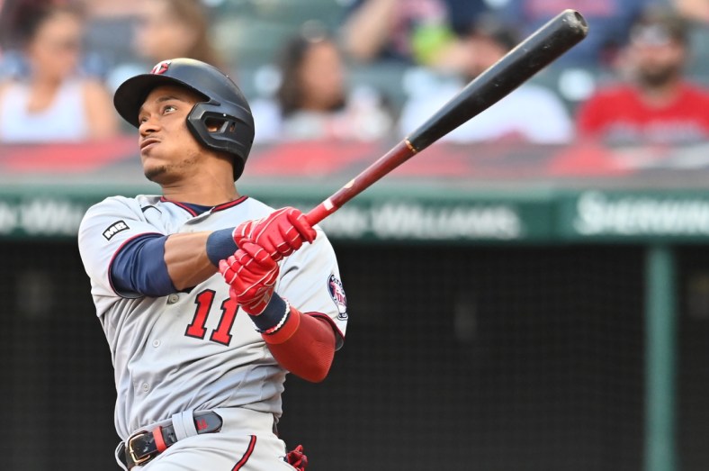 Sep 6, 2021; Cleveland, Ohio, USA; Minnesota Twins second baseman Jorge Polanco (11) hits a home run against the Cleveland Indians during the third inning at Progressive Field. Mandatory Credit: Ken Blaze-USA TODAY Sports