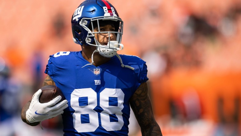 Aug 22, 2021; Cleveland, Ohio, USA; New York Giants tight end Evan Engram (88) runs the ball during warmups before the game against the Cleveland Browns at FirstEnergy Stadium. Mandatory Credit: Scott Galvin-USA TODAY Sports