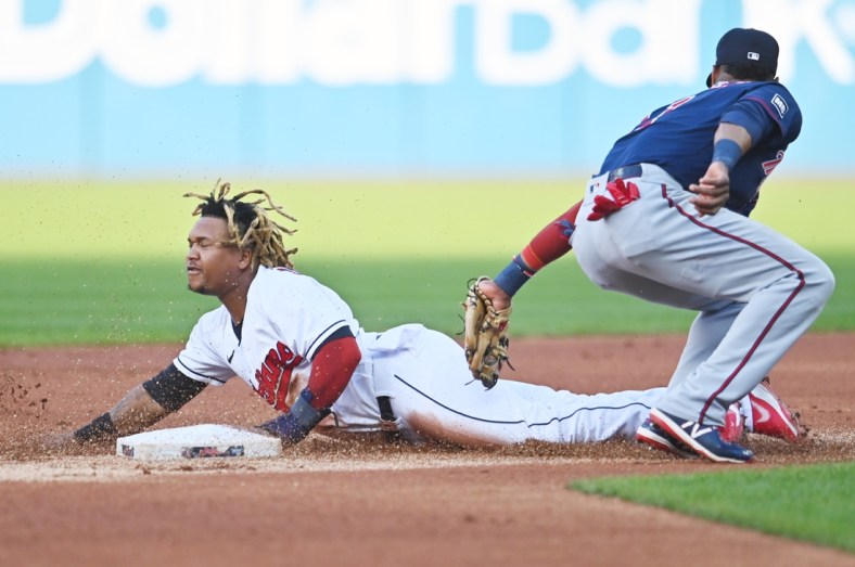 Sep 7, 2021; Cleveland, Ohio, USA; Cleveland Indians third baseman Jose Ramirez (11) steals second as Minnesota Twins second baseman Jorge Polanco (11) is late with the tag during the first inning at Progressive Field. Mandatory Credit: Ken Blaze-USA TODAY Sports