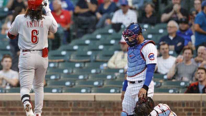 Sep 7, 2021; Chicago, Illinois, USA; Cincinnati Reds third baseman Jonathan India (6) crosses home plate after hitting a solo home run against the Chicago Cubs during the first inning at Wrigley Field. Mandatory Credit: Kamil Krzaczynski-USA TODAY Sports