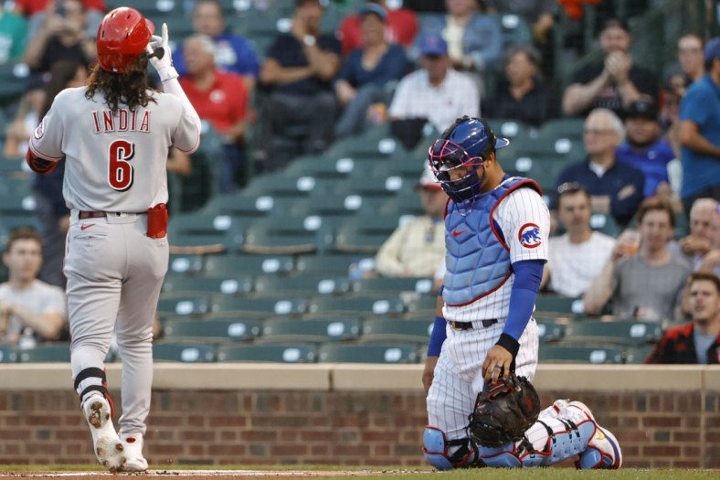 Sep 7, 2021; Chicago, Illinois, USA; Cincinnati Reds third baseman Jonathan India (6) crosses home plate after hitting a solo home run against the Chicago Cubs during the first inning at Wrigley Field. Mandatory Credit: Kamil Krzaczynski-USA TODAY Sports