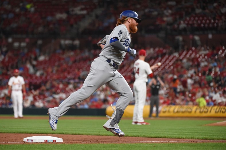 Sep 7, 2021; St. Louis, Missouri, USA; Los Angeles Dodgers third baseman Justin Turner (10) rounds the bases after hitting a solo home run against the St. Louis Cardinals during the fifth inning at Busch Stadium. Mandatory Credit: Joe Puetz-USA TODAY Sports