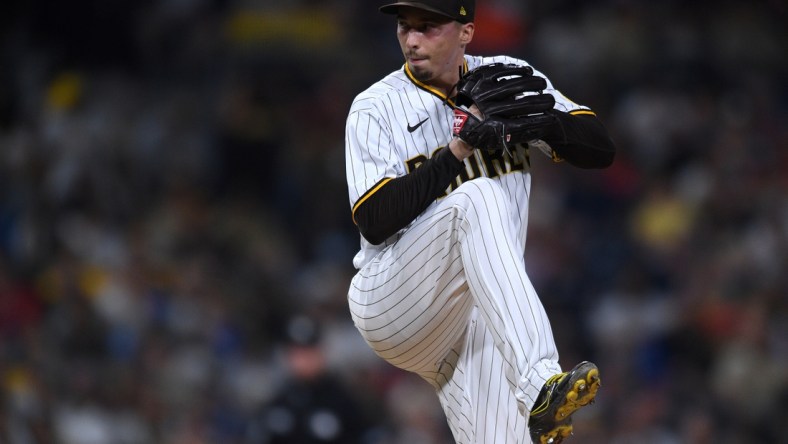 Sep 7, 2021; San Diego, California, USA; San Diego Padres starting pitcher Blake Snell (4) throws a pitch against the Los Angeles Angels during the sixth inning at Petco Park. Mandatory Credit: Orlando Ramirez-USA TODAY Sports