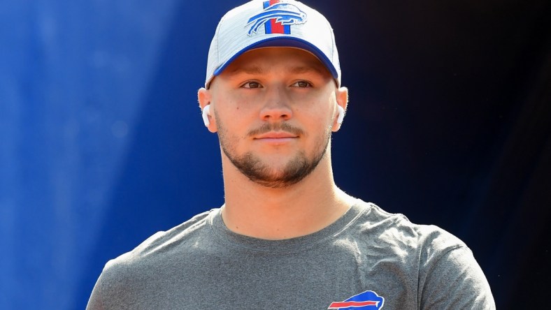 Aug 28, 2021; Orchard Park, New York, USA; Buffalo Bills quarterback Josh Allen (17) walks to the field prior to the game against the Green Bay Packers at Highmark Stadium. Mandatory Credit: Rich Barnes-USA TODAY Sports