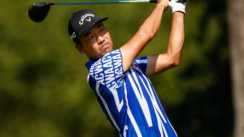 Aug 27, 2021; Owings Mills, Maryland, USA; Kevin Na plays his shot from the second tee during the second round of the BMW Championship golf tournament. Mandatory Credit: Scott Taetsch-USA TODAY Sports