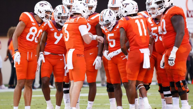 Sep 3, 2021; Blacksburg, Virginia, USA;  Virginia Tech Hokies quarterback Braxton Burmeister (3) runs the huddle during the first quarter against the North Carolina Tar Heels at Lane Stadium. Mandatory Credit: Reinhold Matay-USA TODAY Sports