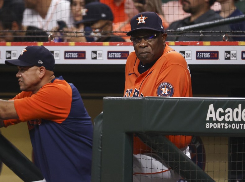 Sep 10, 2021; Houston, Texas, USA; Houston Astros manager Dusty Baker Jr. (12) looks on from the dugout during the fourth inning against the Los Angeles Angels at Minute Maid Park. Mandatory Credit: Troy Taormina-USA TODAY Sports