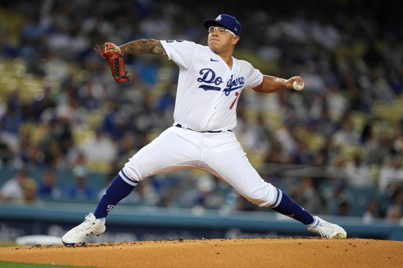 Sep 10, 2021; Los Angeles, California, USA; Los Angeles Dodgers starting pitcher Julio Urias (7) delivers a pitch in the first inning against the San Diego Padres at Dodger Stadium. Mandatory Credit: Kirby Lee-USA TODAY Sports