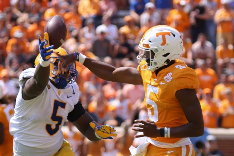 Sep 11, 2021; Knoxville, Tennessee, USA; Pittsburgh Panthers defensive lineman Deslin Alexandre (5) tips a pass from Tennessee Volunteers quarterback Hendon Hooker (5) during the second quarter at Neyland Stadium. Mandatory Credit: Randy Sartin-USA TODAY Sports