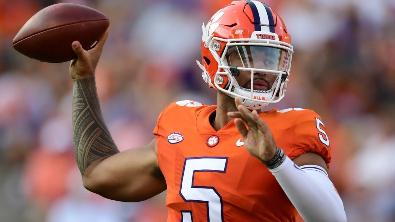 Sep 11, 2021; Clemson, South Carolina, USA; Clemson Tigers quarterback D.J. Uiagalelei (5) looks to throw against the South Carolina State Bulldogs during the second quarter at Memorial Stadium. Mandatory Credit: Adam Hagy-USA TODAY Sports