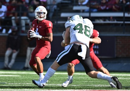 Sep 11, 2021; Pullman, Washington, USA; Washington State Cougars quarterback Jayden de Laura (4) drops back for a pass against the Portland State Vikings in the first half at Gesa Field at Martin Stadium. Mandatory Credit: James Snook-USA TODAY Sports