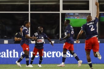 Sep 11, 2021; Foxborough, Massachusetts, USA; New England Revolution midfielder Ema Boateng (11) celebrates his goal against the New York City with forward DeJuan Jones (24) and forward Edward Kizza (19) during the first half at Gillette Stadium. Mandatory Credit: Winslow Townson-USA TODAY Sports