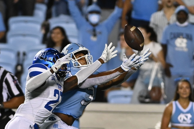 Sep 11, 2021; Chapel Hill, North Carolina, USA; North Carolina Tar Heels wide receiver Antoine Green (3) catches a touchdown pass as Georgia State Panthers cornerback Jaylon Jones (27) defends in the first quarter at Kenan Memorial Stadium. Mandatory Credit: Bob Donnan-USA TODAY Sports