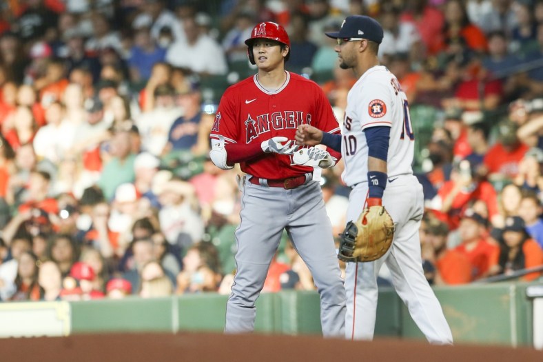 Sep 11, 2021; Houston, Texas, USA; Los Angeles Angels  designated hitter Shohei Ohtani (17) hits a single against the Houston Astros in the first inning at Minute Maid Park. Mandatory Credit: Thomas Shea-USA TODAY Sports