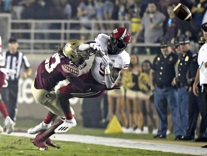 Sep 11, 2021; Tallahassee, Florida, USA; Florida State Seminoles defensive back Sidney Wiliams (23) knocks the ball loose from Jacksonville State Gamecocks wide receiver Ahmad Edwards (9) during the first quarter at Doak S. Campbell Stadium. Mandatory Credit: Melina Myers-USA TODAY Sports