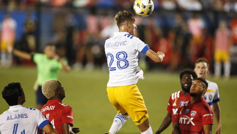 Sep 11, 2021; Frisco, Texas, USA; San Jose Earthquakes forward Benji Kikanovic (28) heads the ball in the second half against FC Dallas at Toyota Stadium. Mandatory Credit: Tim Heitman-USA TODAY Sports