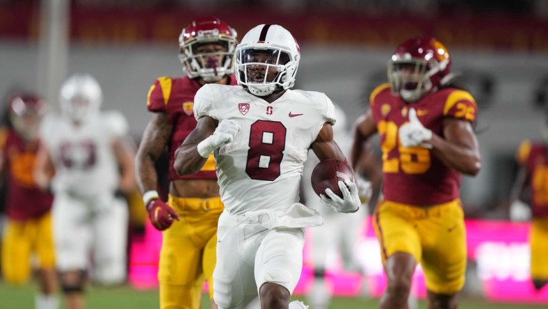 Sep 11, 2021; Los Angeles, California, USA; Stanford Cardinal running back Nathaniel Peat (8) scores on an 87-yard touchdown run against the Southern California Trojans in the first quarter at United Airlines Field at Los Angeles Memorial Coliseum. Mandatory Credit: Kirby Lee-USA TODAY Sports