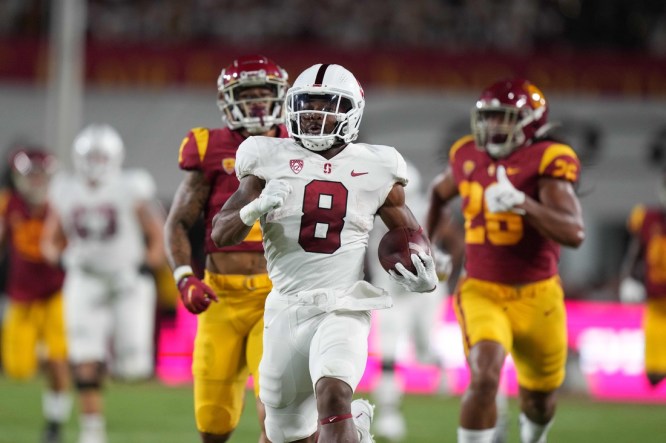 Sep 11, 2021; Los Angeles, California, USA; Stanford Cardinal running back Nathaniel Peat (8) scores on an 87-yard touchdown run against the Southern California Trojans in the first quarter at United Airlines Field at Los Angeles Memorial Coliseum. Mandatory Credit: Kirby Lee-USA TODAY Sports