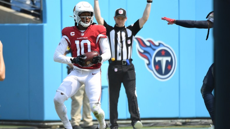 Sep 12, 2021; Nashville, Tennessee, USA; Arizona Cardinals wide receiver DeAndre Hopkins (10) after a touchdown reception during the first half against the Tennessee Titans at Nissan Stadium. Mandatory Credit: Christopher Hanewinckel-USA TODAY Sports