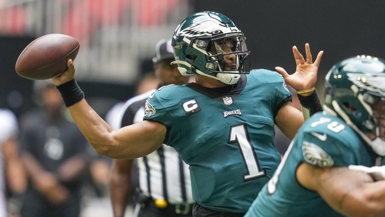 Sep 12, 2021; Atlanta, Georgia, USA; Philadelphia Eagles quarterback Jalen Hurts (1) passes the ball against the Atlanta Falcons during the first quarter at Mercedes-Benz Stadium. Mandatory Credit: Dale Zanine-USA TODAY Sports