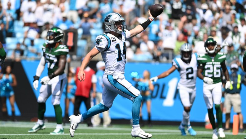 Sep 12, 2021; Charlotte, North Carolina, USA;  Carolina Panthers quarterback Sam Darnold (14) scores a touchdown in the second quarter at Bank of America Stadium. Mandatory Credit: Bob Donnan-USA TODAY Sports