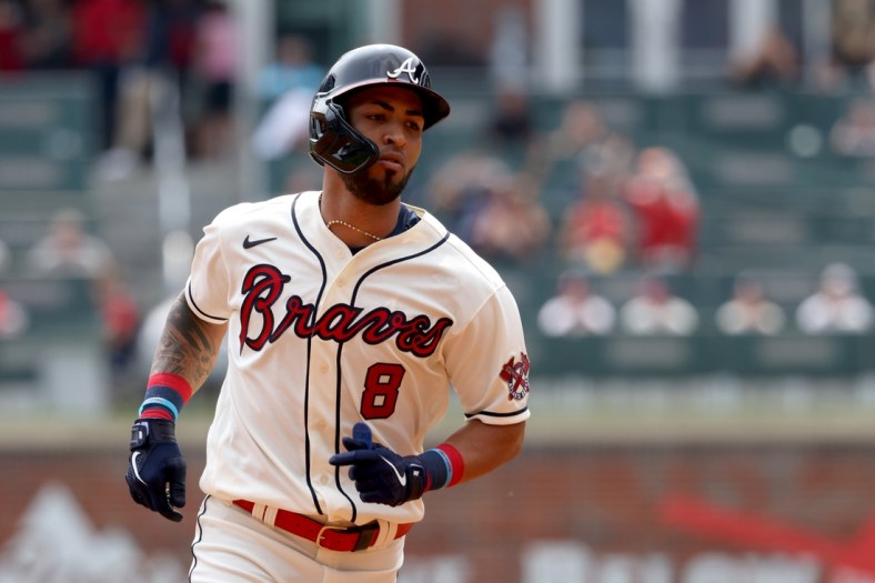 Sep 12, 2021; Atlanta, Georgia, USA; Atlanta Braves outfielder Eddie Rosario (8) runs home after hitting a two-run home run during the fourth inning against the Miami Marlins at Truist Park. Mandatory Credit: Jason Getz-USA TODAY Sports