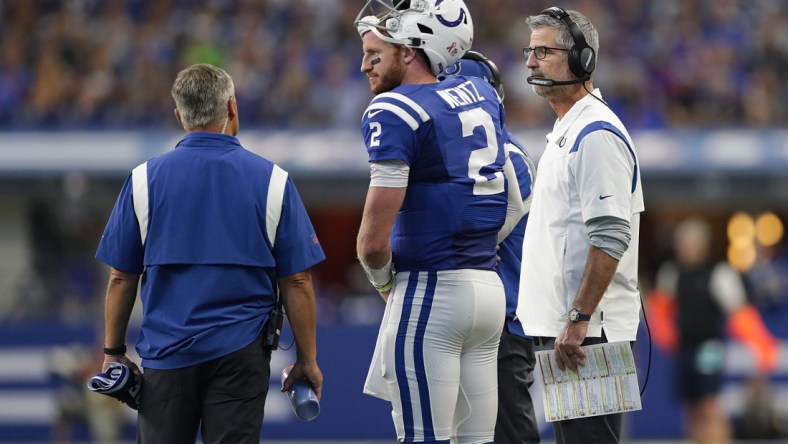 Indianapolis Colts head coach Frank Reich (right) talks with quarterback Carson Wentz (2) on Sunday, Sept. 12, 2021, at Lucas Oil Stadium and Indianapolis. The Seahawks defeated the Colts, 28-16.Indianapolis Colts And Seattle Seahawks On Nfl Week 1 At Lucas Oil Stadium Sunday Sept 12 2021