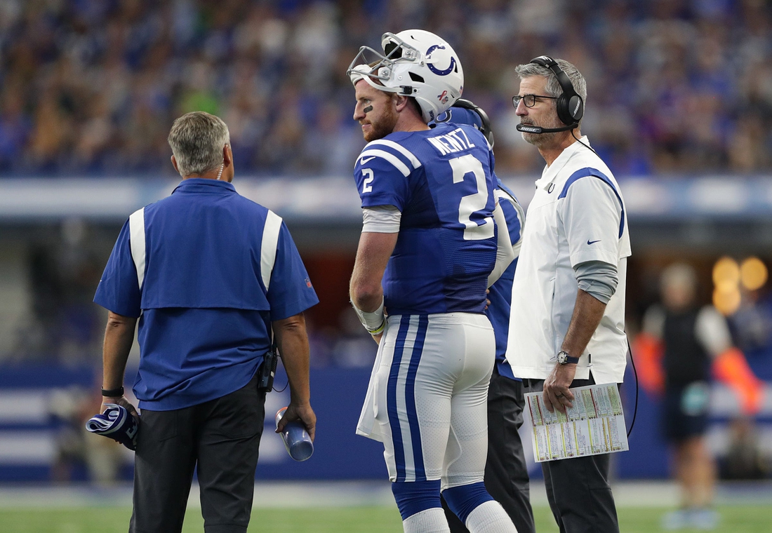 Indianapolis Colts head coach Frank Reich (right) talks with quarterback Carson Wentz (2) on Sunday, Sept. 12, 2021, at Lucas Oil Stadium and Indianapolis. The Seahawks defeated the Colts, 28-16.Indianapolis Colts And Seattle Seahawks On Nfl Week 1 At Lucas Oil Stadium Sunday Sept 12 2021