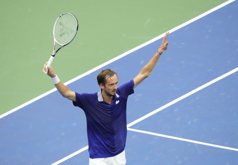 Sep 12, 2021; Flushing, NY, USA; Daniil Medvedev of Russia reacts after winning a game in the third set against Novak Djokovic of Serbia in the men's singles final on day fourteen of the 2021 U.S. Open tennis tournament at USTA Billie Jean King National Tennis Center. Mandatory Credit: Robert Deutsch-USA TODAY Sports