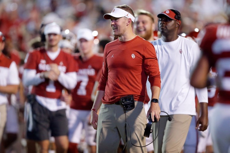 OU coach Lincoln Riley smiles after a touchdown Saturday night.

jump