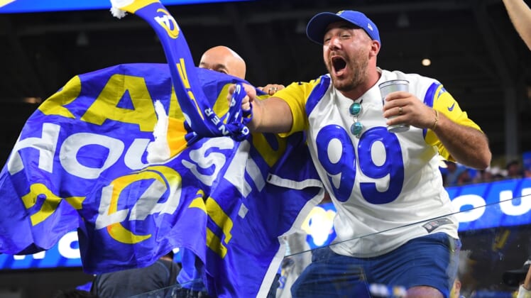Sep 12, 2021; Inglewood, California, USA;   Los Angeles Rams fans celebrate after a touchdown in the second half against the Chicago Bears at SoFi Stadium. Mandatory Credit: Jayne Kamin-Oncea-USA TODAY Sports
