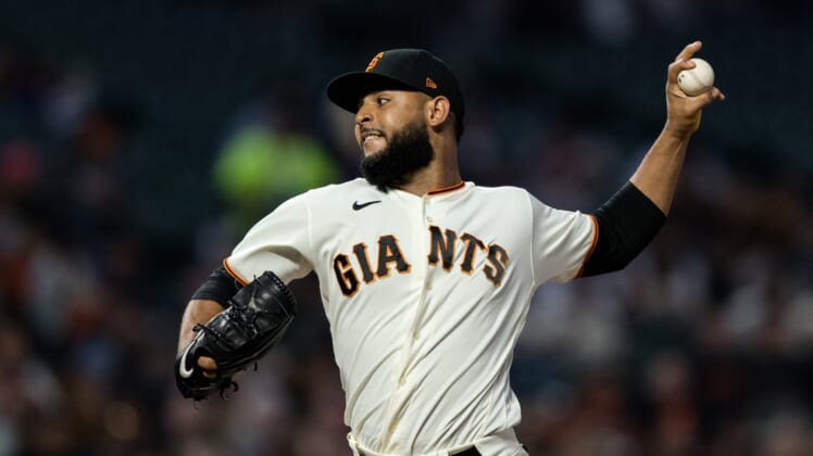Sep 13, 2021; San Francisco, California, USA; San Francisco Giants relief pitcher Jarlin Garcia (66) throws against the San Diego Padres in the third inning at at Oracle Park. Mandatory Credit: John Hefti-USA TODAY Sports