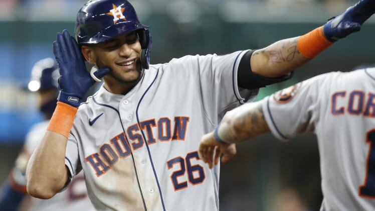 Sep 13, 2021; Arlington, Texas, USA;  Houston Astros right fielder Jose Siri (26) reacts as he walks back to the dugout after hitting a two run home in the third inning against the Texas Rangers at Globe Life Field. Mandatory Credit: Tim Heitman-USA TODAY Sports