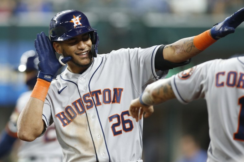 Sep 13, 2021; Arlington, Texas, USA;  Houston Astros right fielder Jose Siri (26) reacts as he walks back to the dugout after hitting a two run home in the third inning against the Texas Rangers at Globe Life Field. Mandatory Credit: Tim Heitman-USA TODAY Sports
