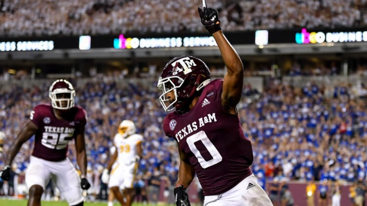 Sep 4, 2021;  College Station, Texas, USA;  Texas A&M Aggies wide receiver Ainias Smith (0) reacts after his touchdown in the fourth quarter against the Kent State Golden Flashes at Kyle Field. Mandatory Credit: Maria Lysaker-USA TODAY Sports