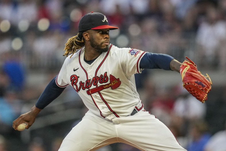 Sep 14, 2021; Cumberland, Georgia, USA; Atlanta Braves starting pitcher Touki Toussaint (62) pitches against the Colorado Rockies during the first inning at Truist Park. Mandatory Credit: Dale Zanine-USA TODAY Sports