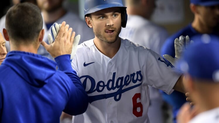 Sep 14, 2021; Los Angeles, California, USA;  Dodgers shortstop Trea Turner (6) celebrates in the dugout after hitting a solo home run against the Arizona Diamondbacks in the fifth inning at Dodger Stadium. Mandatory Credit: Jayne Kamin-Oncea-USA TODAY Sports