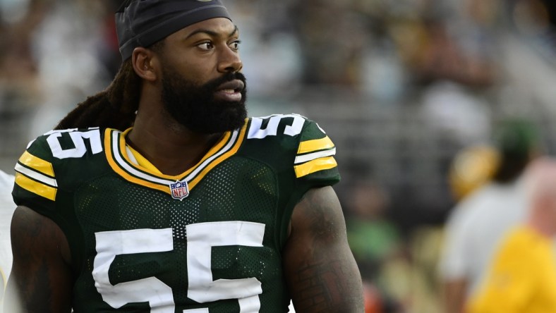 Sep 12, 2021; Jacksonville, Florida, USA;  Green Bay Packers linebacker Za'Darius Smith (55) stands on the sidelines during the game against the New Orleans Saints at TIAA Bank Field. Mandatory Credit: Tommy Gilligan-USA TODAY Sports