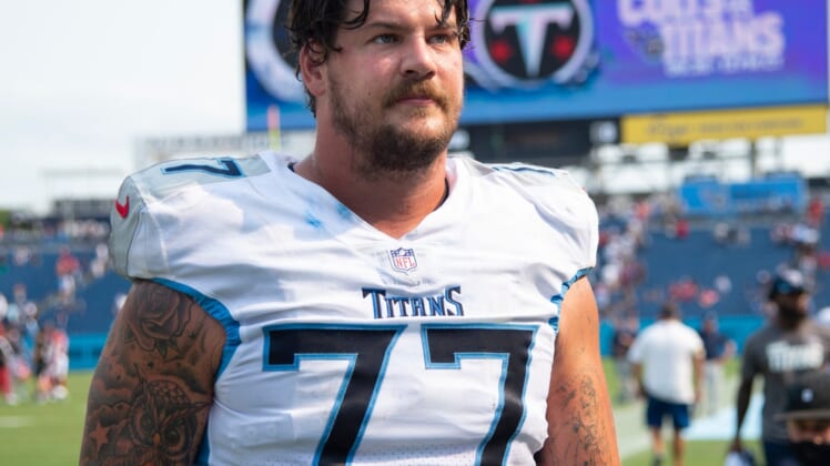 Tennessee Titans offensive tackle Taylor Lewan (77) walks off the field after their 38 to 13 loss against the Arizona Cardinals at Nissan Stadium Sunday, Sept. 12, 2021 in Nashville, Tenn.Nas Titans Cardinals 026