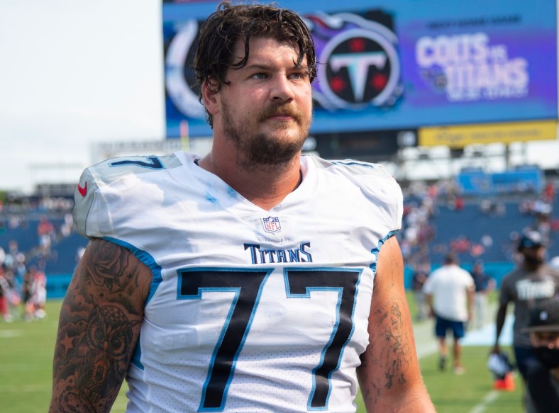 Tennessee Titans offensive tackle Taylor Lewan (77) walks off the field after their 38 to 13 loss against the Arizona Cardinals at Nissan Stadium Sunday, Sept. 12, 2021 in Nashville, Tenn.

Nas Titans Cardinals 026