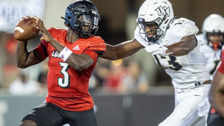 UofL quarterback Malik Cunningham is sacked during the first half Friday evening as the Louisville Cardinals took on the University of Central Florida at Cardinal Stadium. The Cardinals led 21-14 at halftime. Sept. 17, 2021

As 4148 Uofl Ucf 1sthalf351