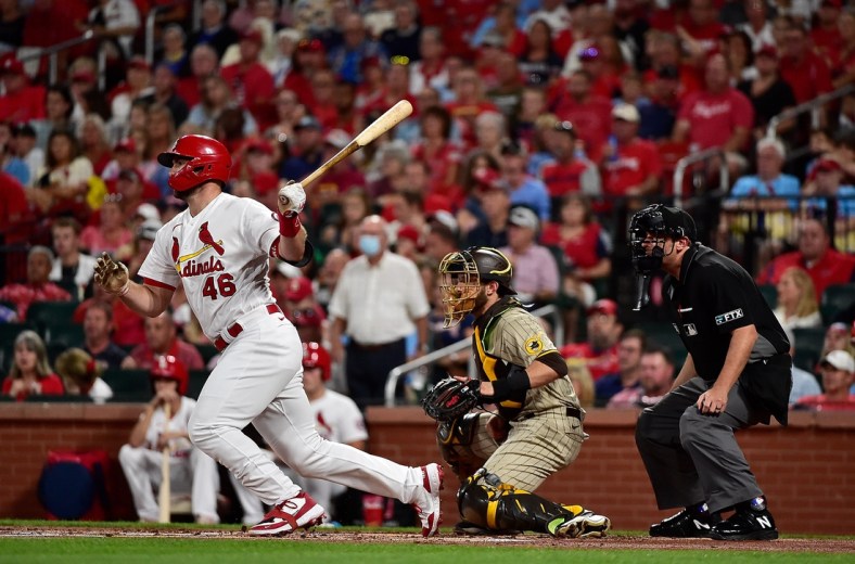 Sep 17, 2021; St. Louis, Missouri, USA;  St. Louis Cardinals first baseman Paul Goldschmidt (46) hits a one run single during the first inning against the San Diego Padres at Busch Stadium. Mandatory Credit: Jeff Curry-USA TODAY Sports