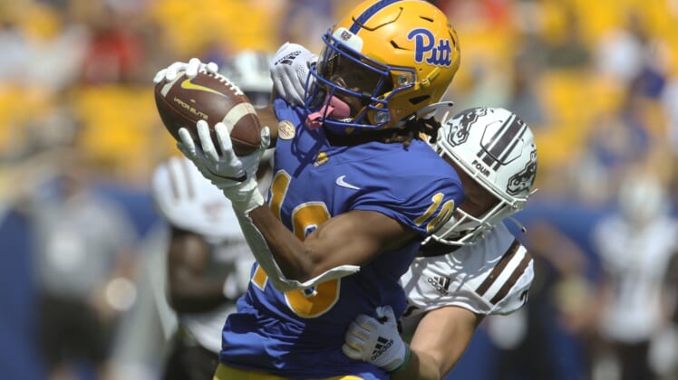 Sep 18, 2021; Pittsburgh, Pennsylvania, USA; Pittsburgh Panthers wide receiver Jaylon Barden (10) makes a catch against Western Michigan Broncos safety Ryan Kilburg (rear) during the second quarter at Heinz Field. Mandatory Credit: Charles LeClaire-USA TODAY Sports