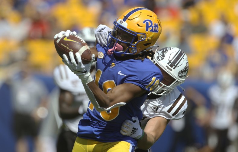 Sep 18, 2021; Pittsburgh, Pennsylvania, USA; Pittsburgh Panthers wide receiver Jaylon Barden (10) makes a catch against Western Michigan Broncos safety Ryan Kilburg (rear) during the second quarter at Heinz Field. Mandatory Credit: Charles LeClaire-USA TODAY Sports