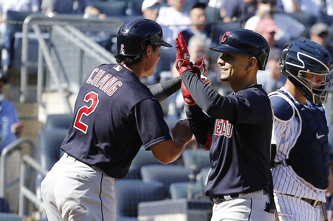 Sep 18, 2021; Bronx, New York, USA; Cleveland Indians shortstop Andres Gimenez (0) is congratulated by first baseman Yu Chang (2) after hitting a three run home run against the New York Yankees during the fifth inning at Yankee Stadium. Mandatory Credit: Andy Marlin-USA TODAY Sports