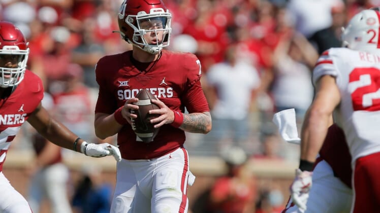 Oklahoma's Spencer Rattler (7) drops back to pass during a college football game between the University of Oklahoma Sooners (OU) and the Nebraska Cornhuskers at Gaylord Family-Oklahoma Memorial Stadium in Norman, Okla., Saturday, Sept. 18, 2021. Oklahoma won 23-16.Lx15470