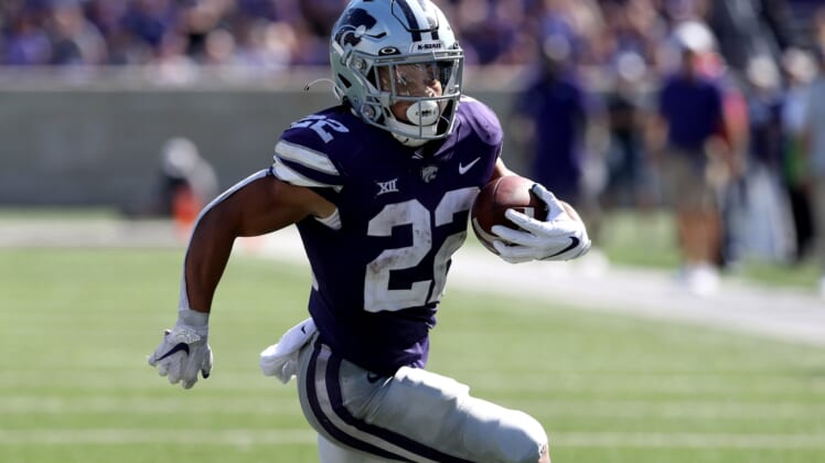 Sep 18, 2021; Manhattan, Kansas, USA; Kansas State Wildcats running back Deuce Vaughn (22) carries the ball during the fourth quarter against the Nevada Wolf Pack at Bill Snyder Family Football Stadium. Mandatory Credit: Scott Sewell-USA TODAY Sports